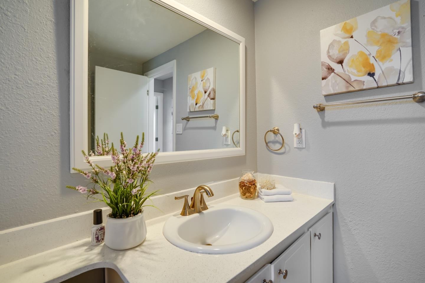 3143 Kermath Drive San Jose, CA 95132 - Photo 43 of 62 a bathroom with a sink and a mirror
