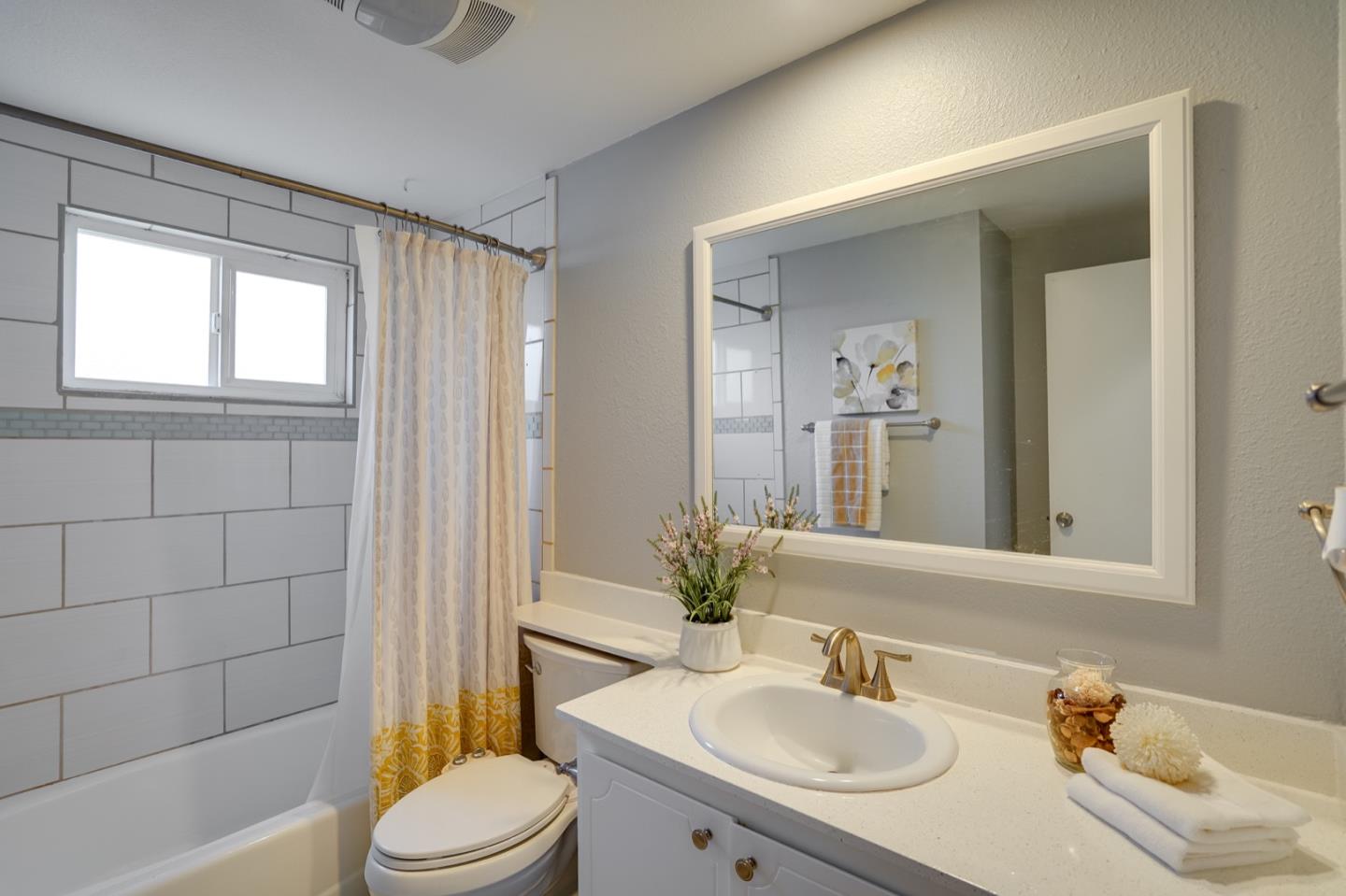 3143 Kermath Drive San Jose, CA 95132 - Photo 44 of 62 a bathroom with a sink toilet and shower