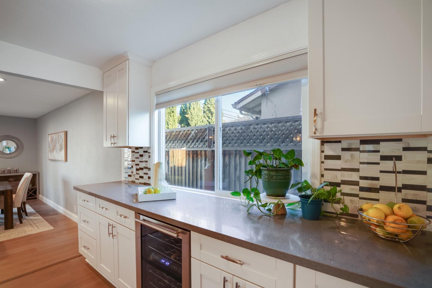 3143 Kermath Drive San Jose, CA 95132 - Photo 6 of 62 a kitchen with a sink and a potted plant