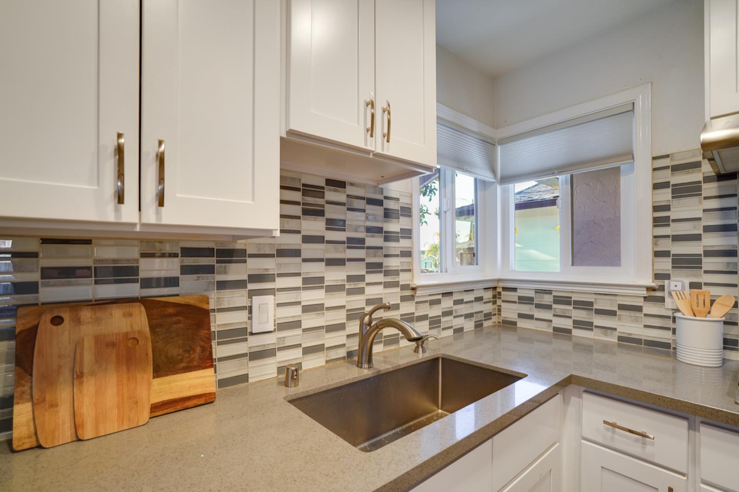 3143 Kermath Drive San Jose, CA 95132 - Photo 7 of 62 a kitchen with stainless steel appliances granite countertop a sink and a granite counter tops