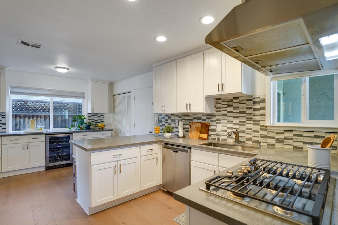 3143 Kermath Drive San Jose, CA 95132 - Photo 8 of 62 a kitchen with stainless steel appliances a sink stove and cabinets