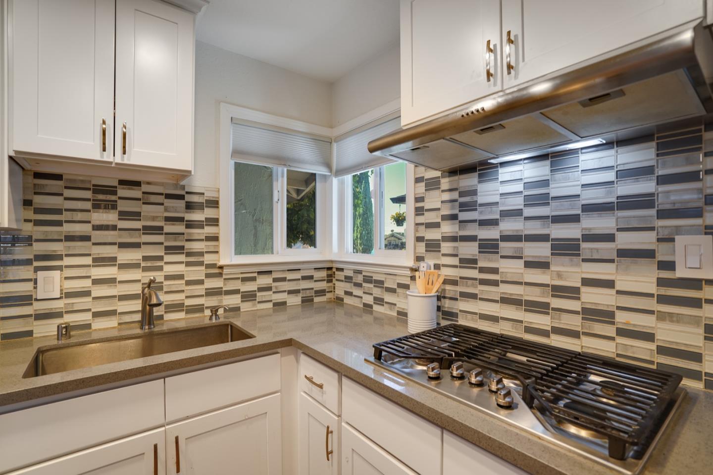 3143 Kermath Drive San Jose, CA 95132 - Photo 9 of 62 a kitchen with a sink and cabinets