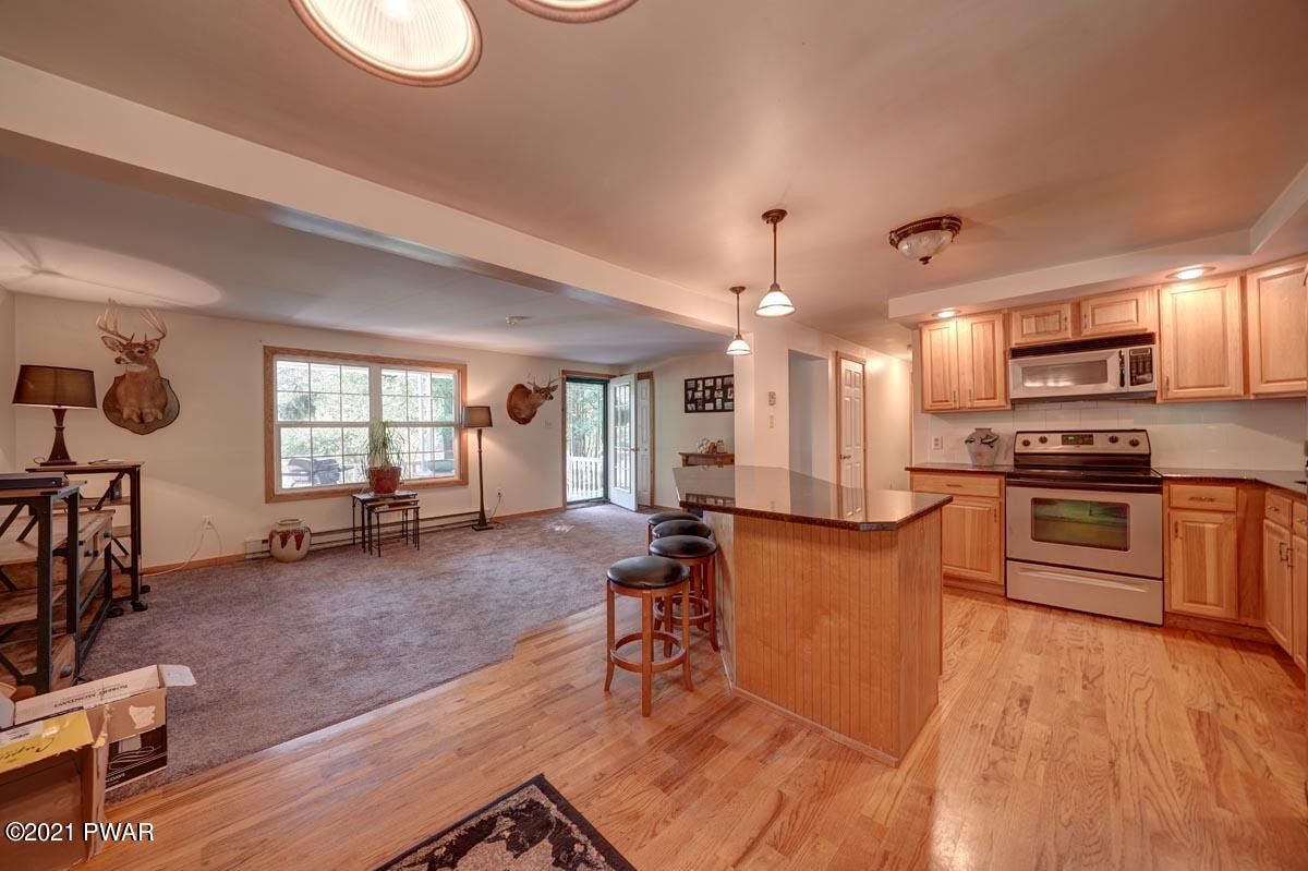 114 Wynooska Road Greentown, PA 18426 - Photo 5 of 29 Kitchen into Living Room