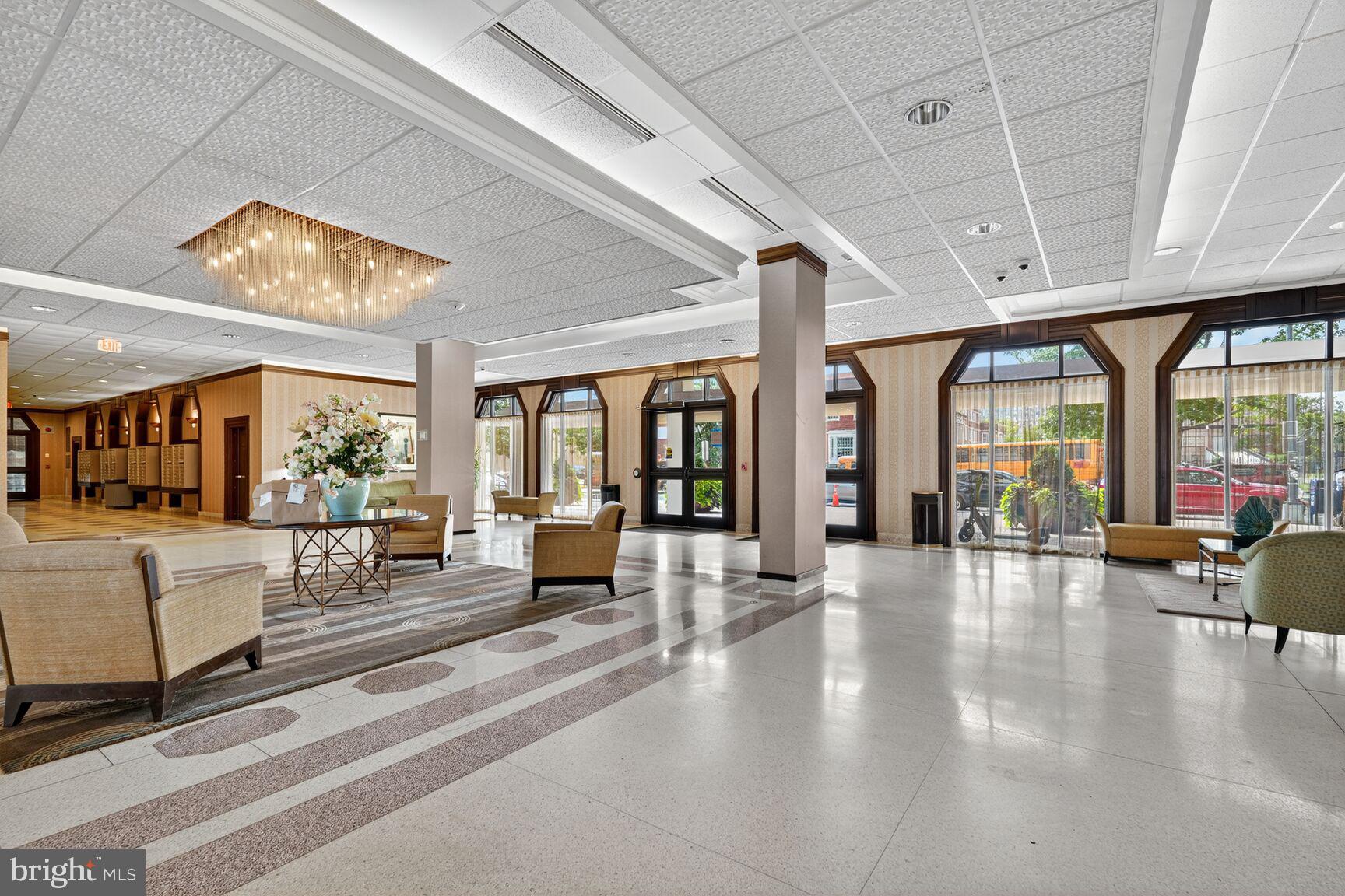 700 7th Street Southwest, Unit 716 Washington, DC 20024 - Photo 13 of 23 a lobby with furniture and large windows