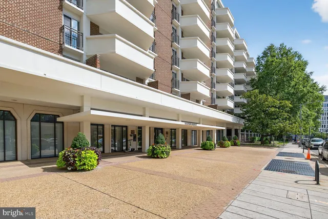 a front view of a building with garden