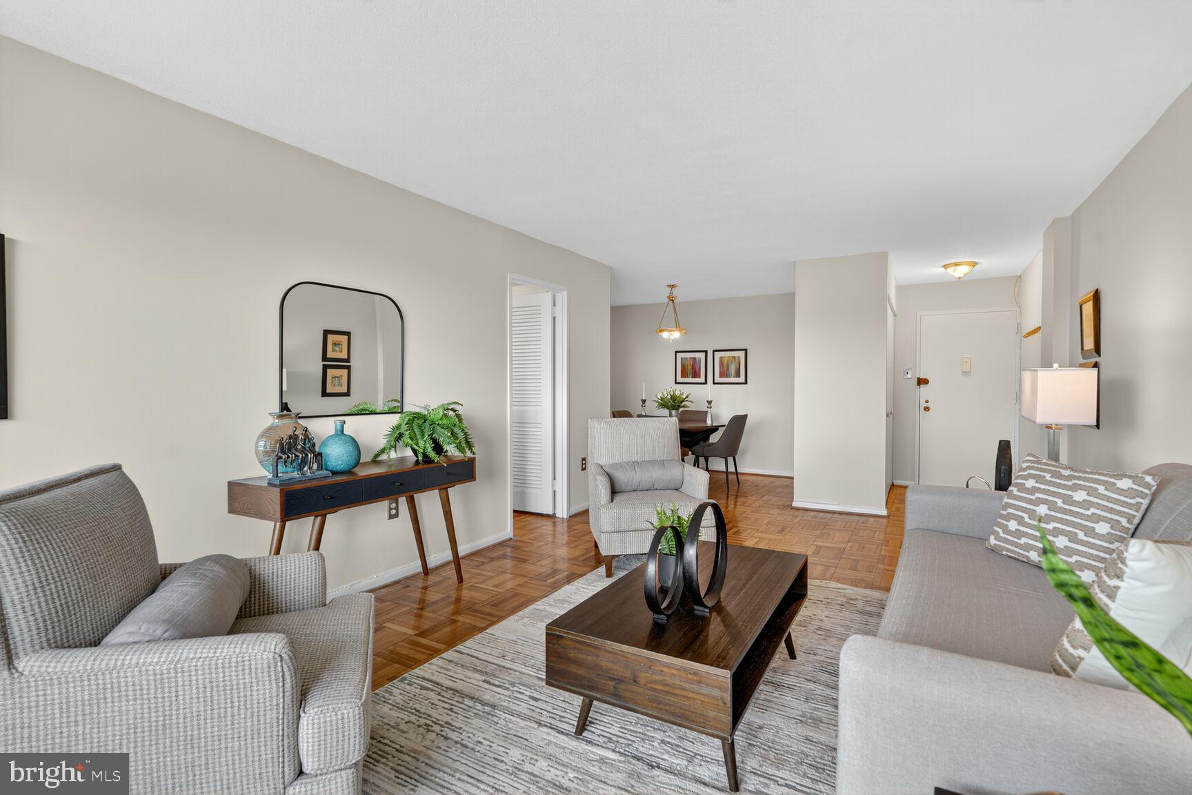 700 7th Street Southwest, Unit 716 Washington, DC 20024 - Photo 2 of 23 a living room with furniture and wooden floor