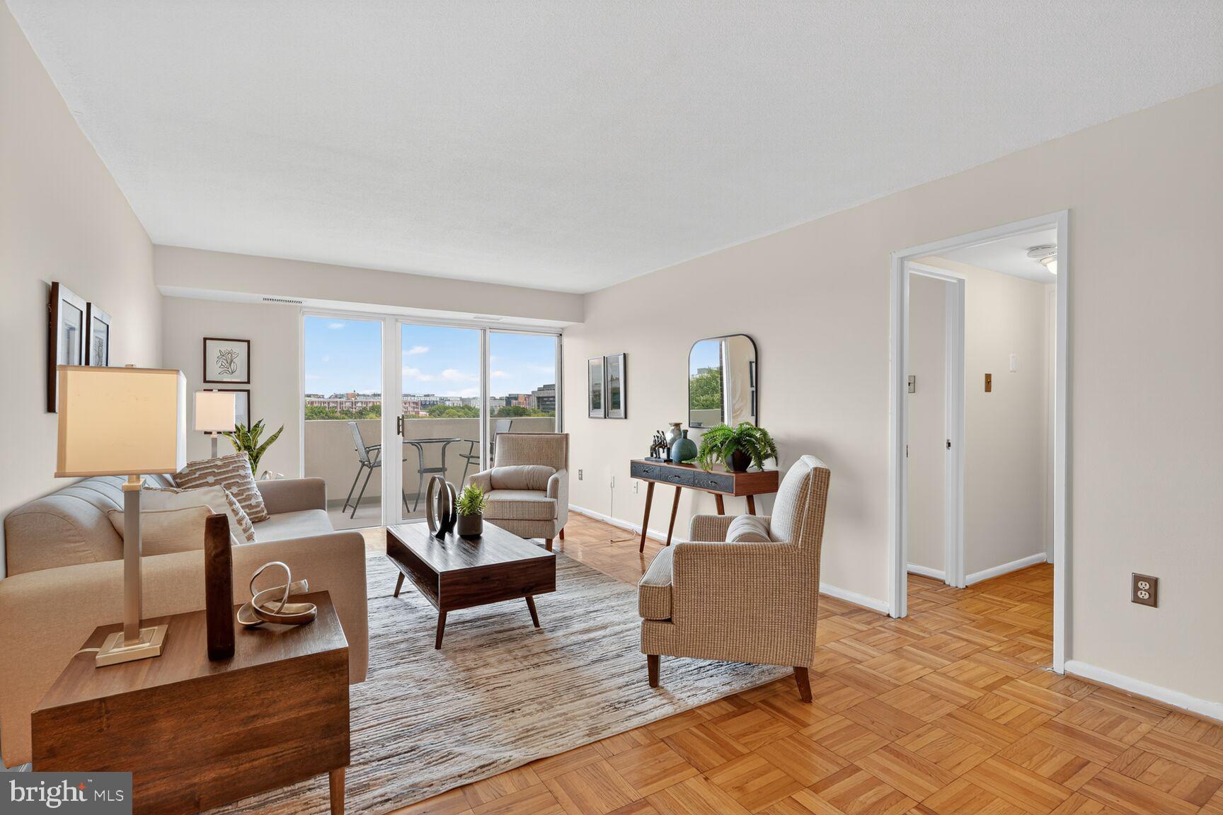 700 7th Street Southwest, Unit 716 Washington, DC 20024 - Photo 3 of 23 a living room with furniture and a table