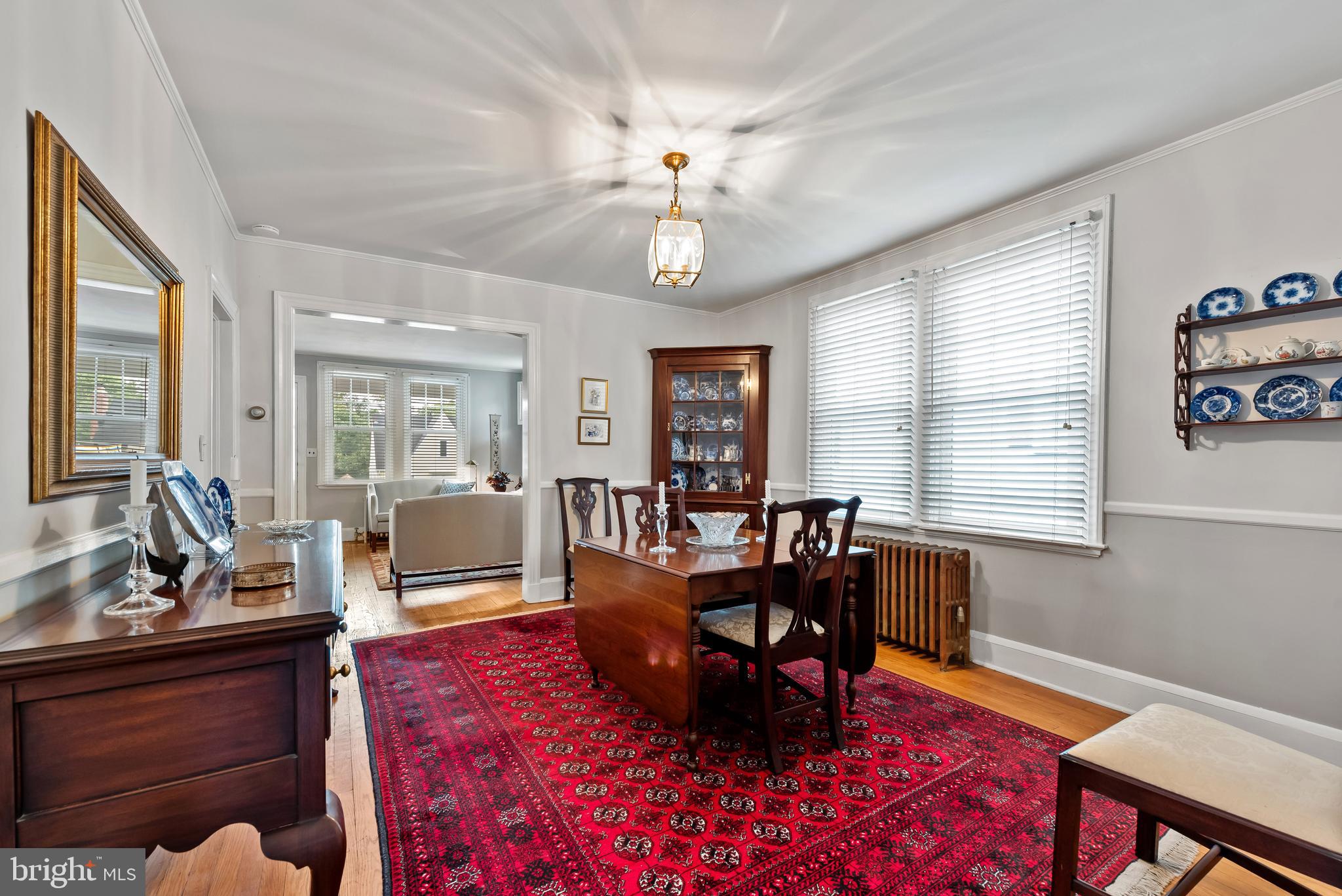 706 Murdock Road Baltimore, MD 21212 - Photo 12 of 39 a living room with furniture two window and a table