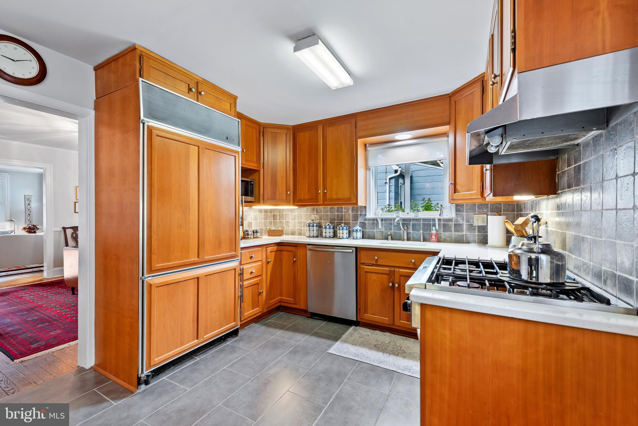 706 Murdock Road Baltimore, MD 21212 - Photo 16 of 39 a kitchen with stainless steel appliances granite countertop a refrigerator and a stove top oven