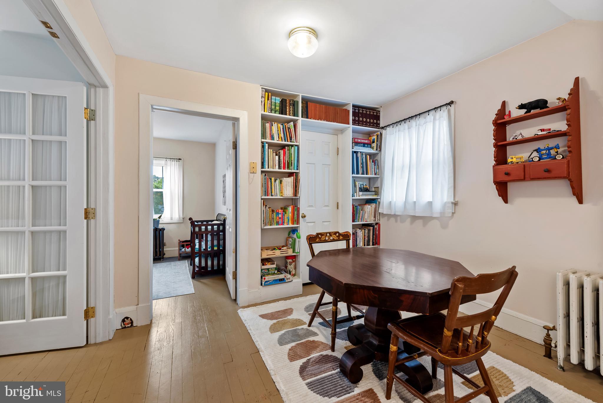 706 Murdock Road Baltimore, MD 21212 - Photo 26 of 39 a workspace with furniture and a potted plant