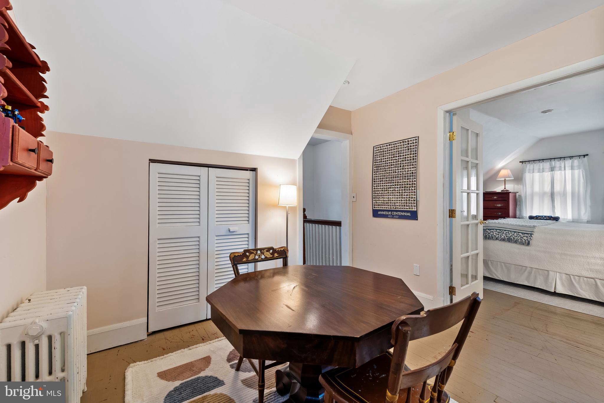 706 Murdock Road Baltimore, MD 21212 - Photo 27 of 39 a view of a dining room with furniture and wooden floor