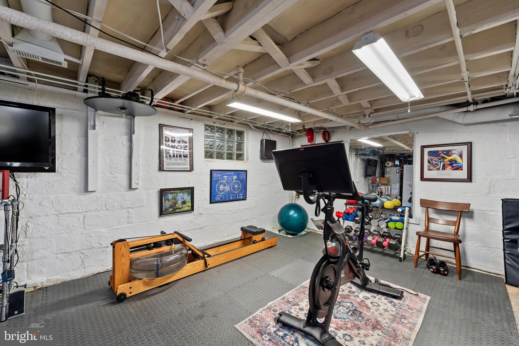 706 Murdock Road Baltimore, MD 21212 - Photo 30 of 39 a room with furniture and a flat screen tv