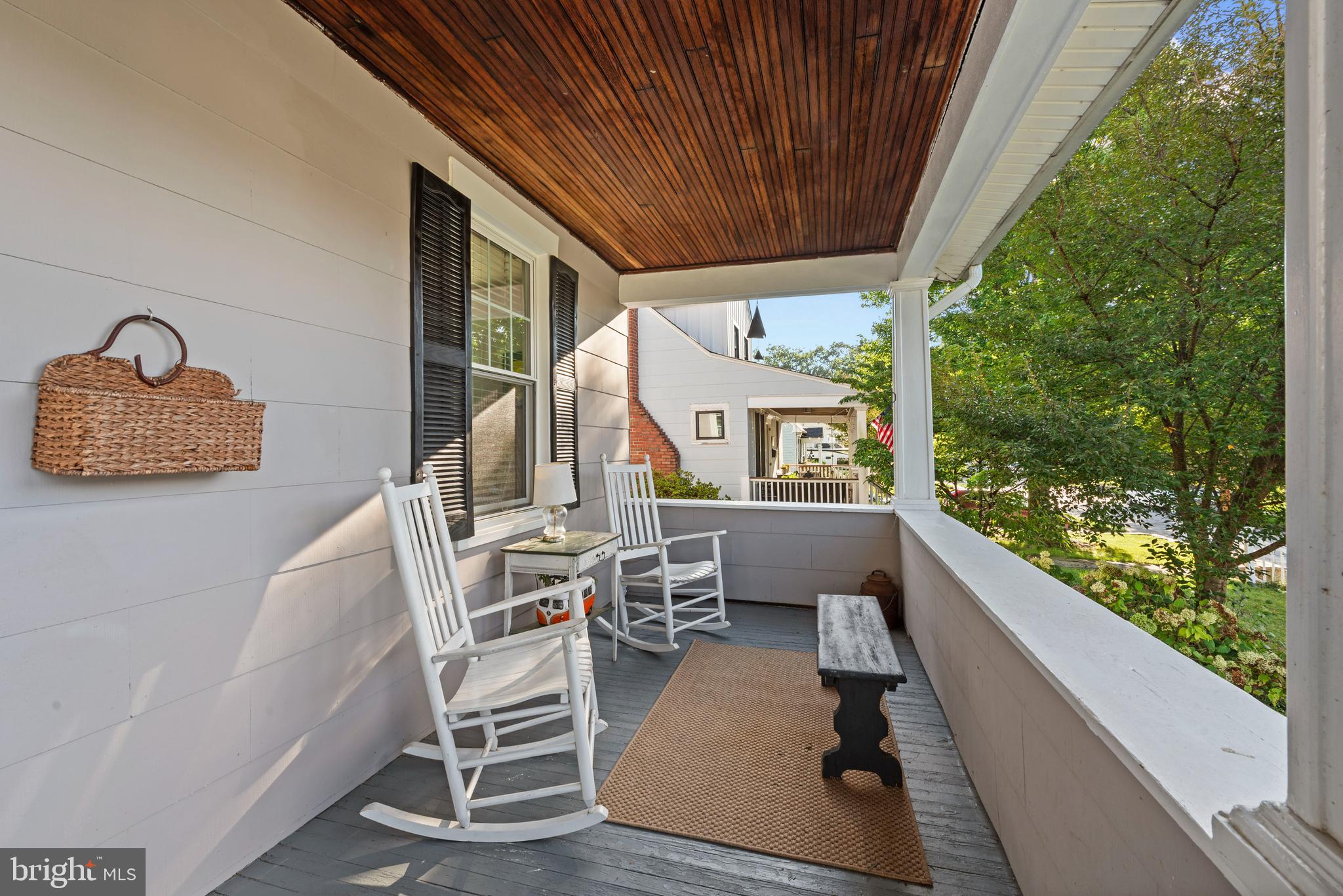 706 Murdock Road Baltimore, MD 21212 - Photo 5 of 39 a balcony with chairs and a table