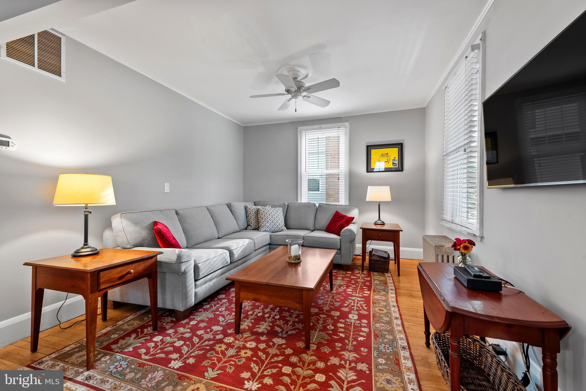 706 Murdock Road Baltimore, MD 21212 - Photo 7 of 39 a living room with furniture and a flat screen tv