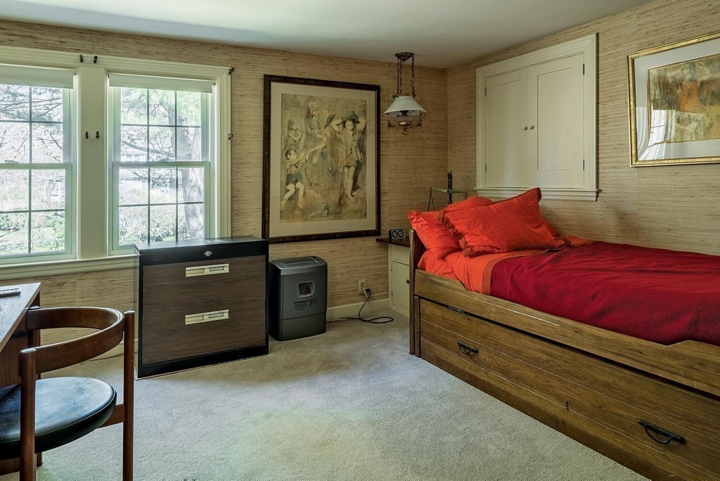 107 Arnold Road Newton, MA 02459 - Photo 12 of 18 a bedroom with a bed and a window
