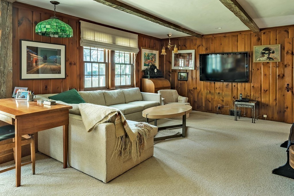 107 Arnold Road Newton, MA 02459 - Photo 6 of 18 a living room with furniture and a flat screen tv