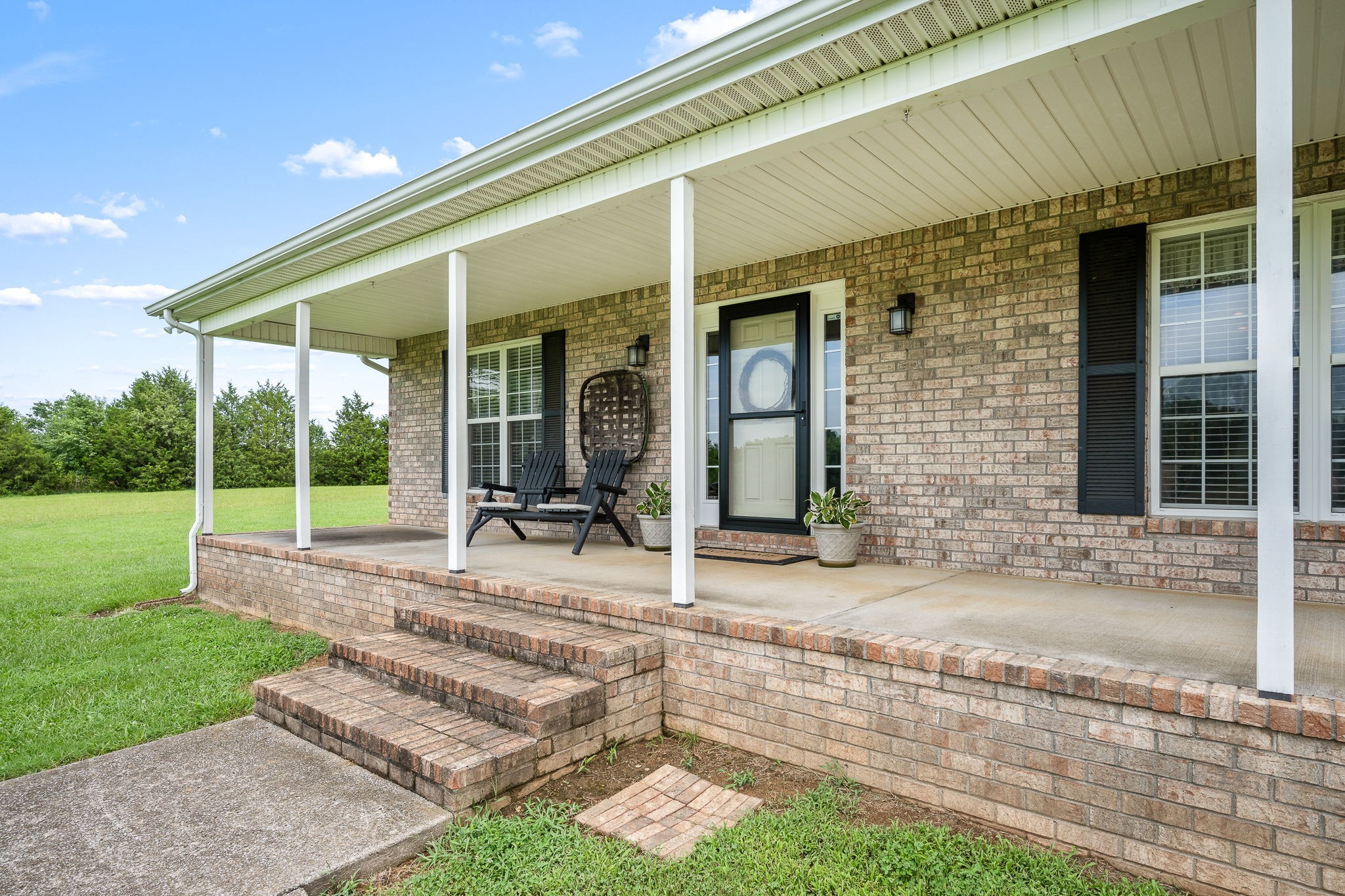 4330 River Lane Milton, TN 37118 - Photo 1 of 44 a view of a house with backyard and porch