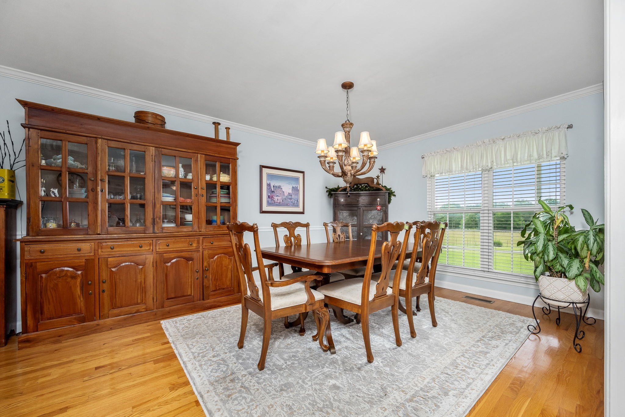 4330 River Lane Milton, TN 37118 - Photo 11 of 44 a view of a dining room with furniture window and wooden floor