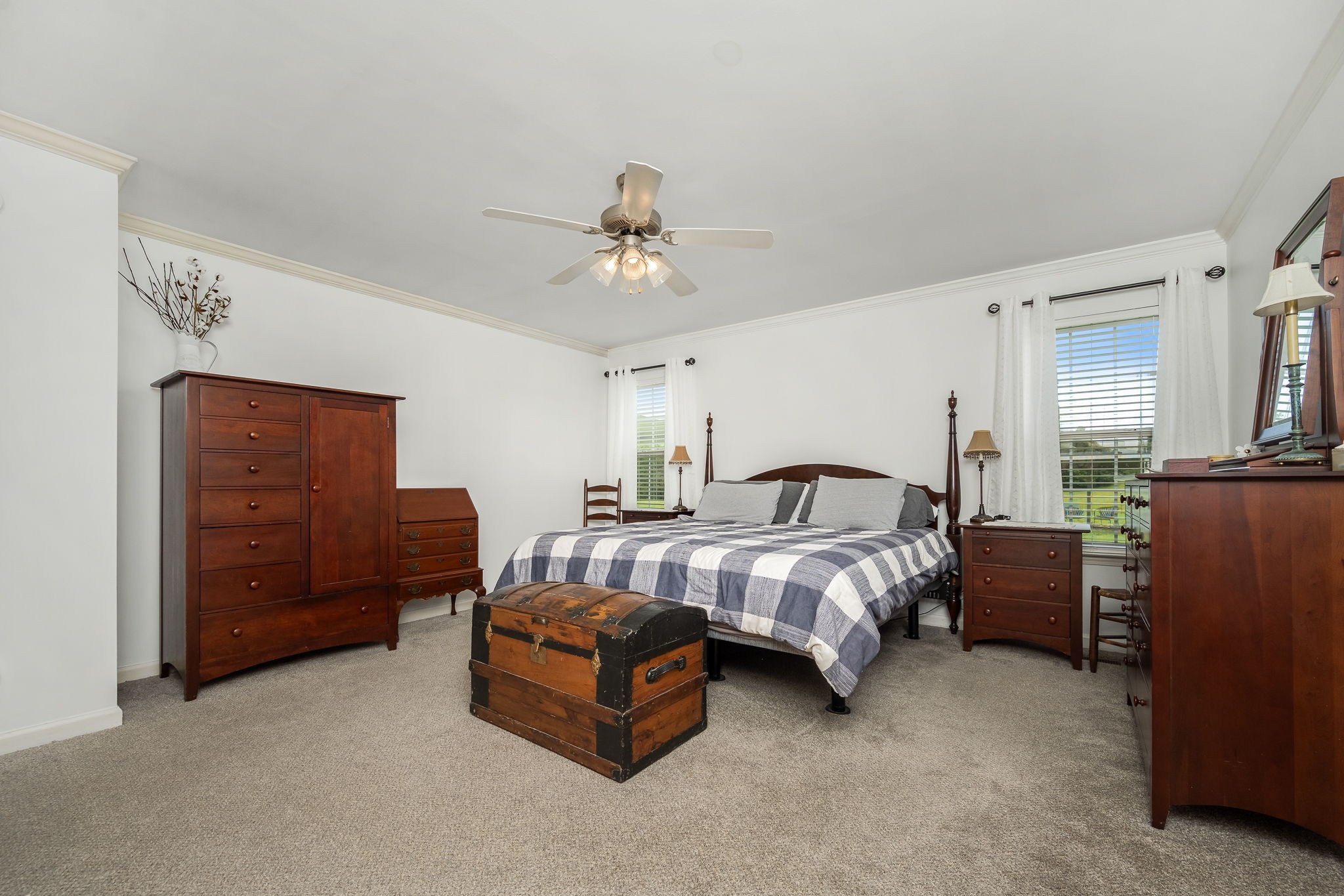 4330 River Lane Milton, TN 37118 - Photo 19 of 44 a spacious bedroom with a bed and a chandelier