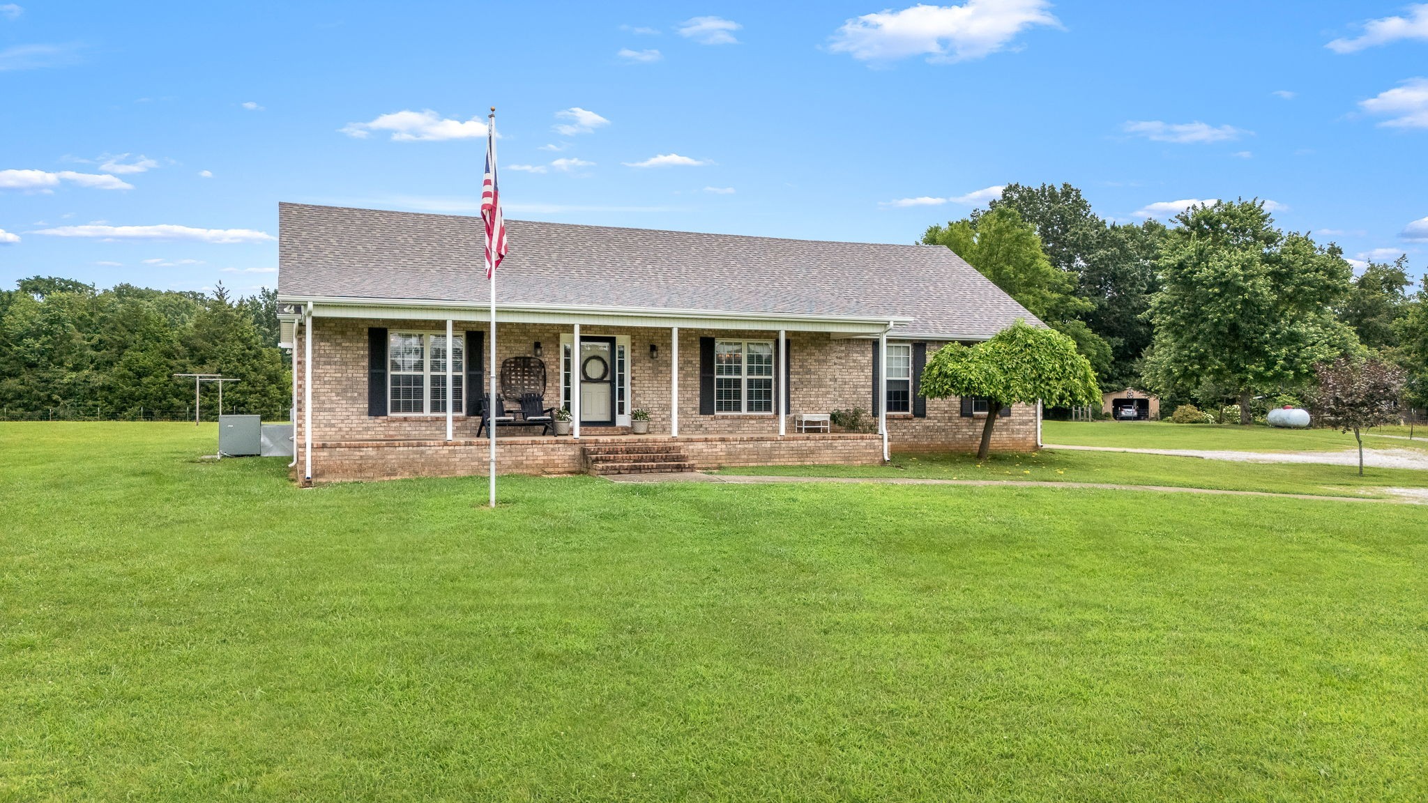 4330 River Lane Milton, TN 37118 - Photo 2 of 44 a front view of a house with a yard