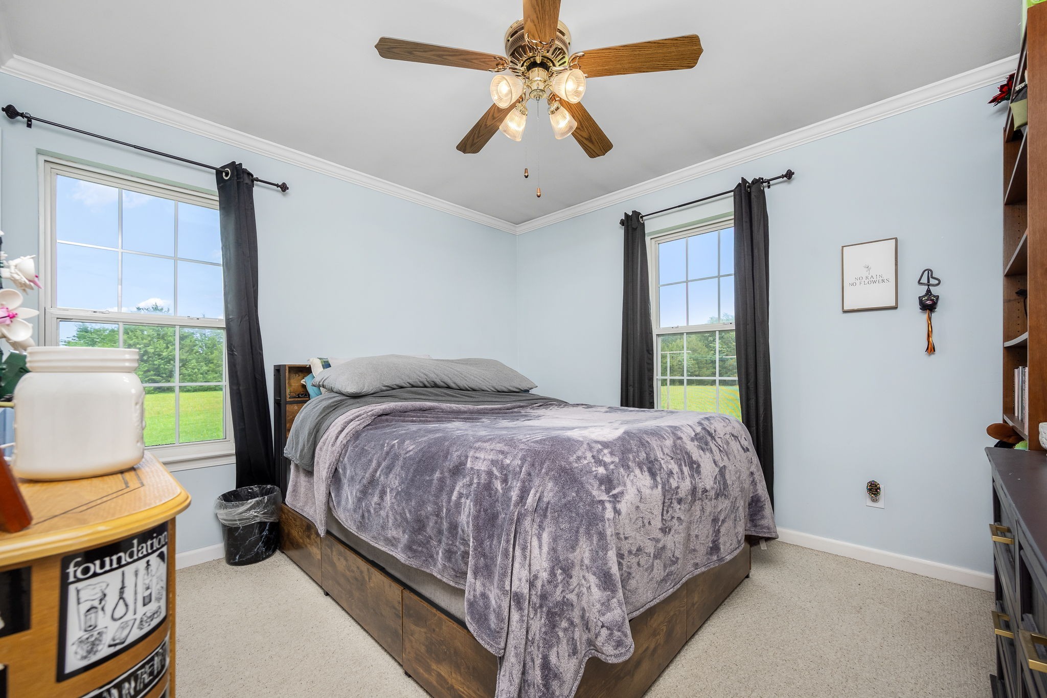 4330 River Lane Milton, TN 37118 - Photo 25 of 44 a bedroom with a bed and a chandelier