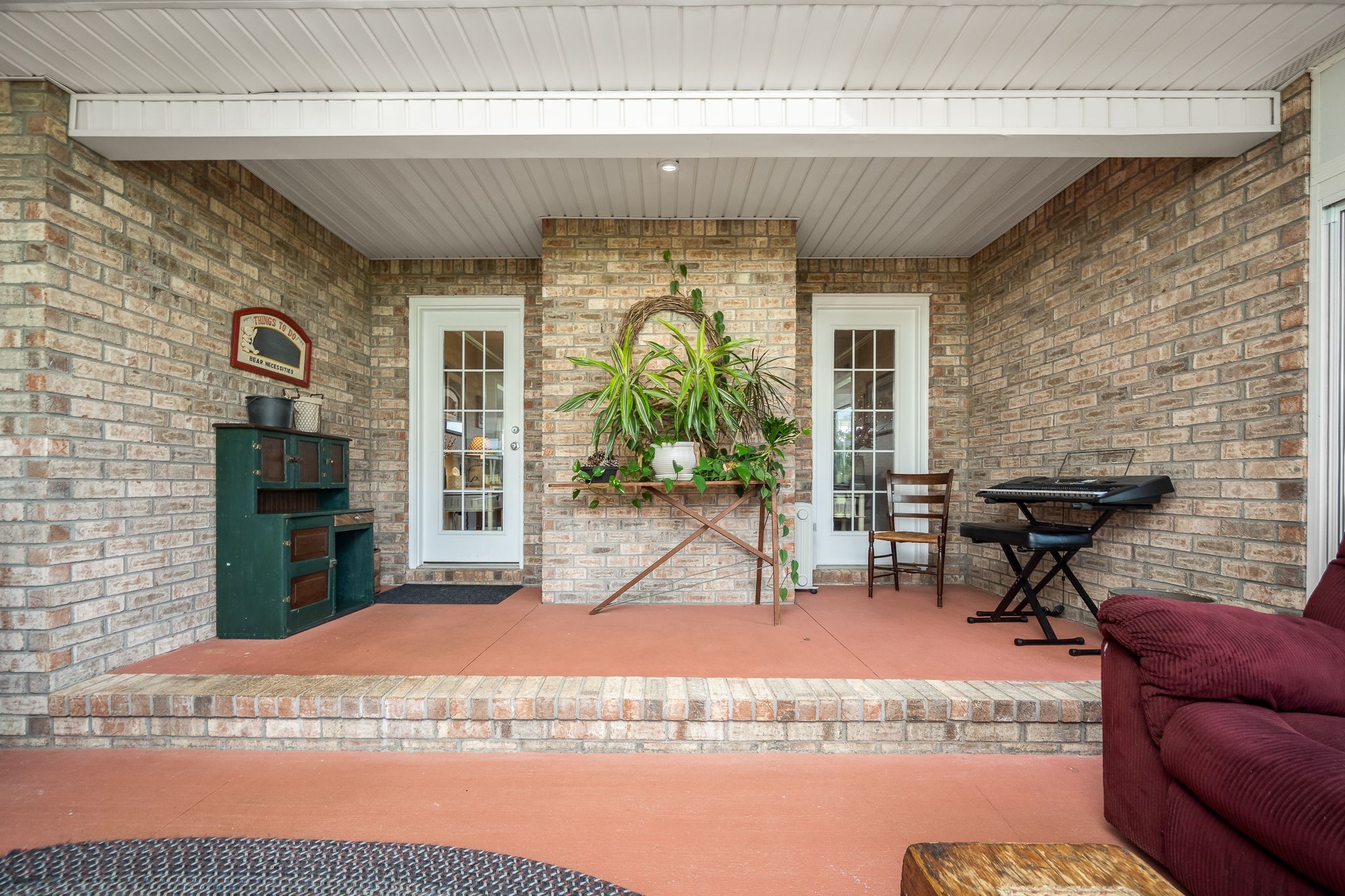 4330 River Lane Milton, TN 37118 - Photo 27 of 44 a view of living room kitchen with furniture and a fireplace