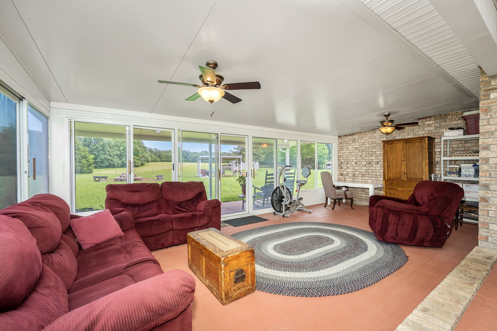 4330 River Lane Milton, TN 37118 - Photo 28 of 44 a living room with furniture a large window and a chandelier