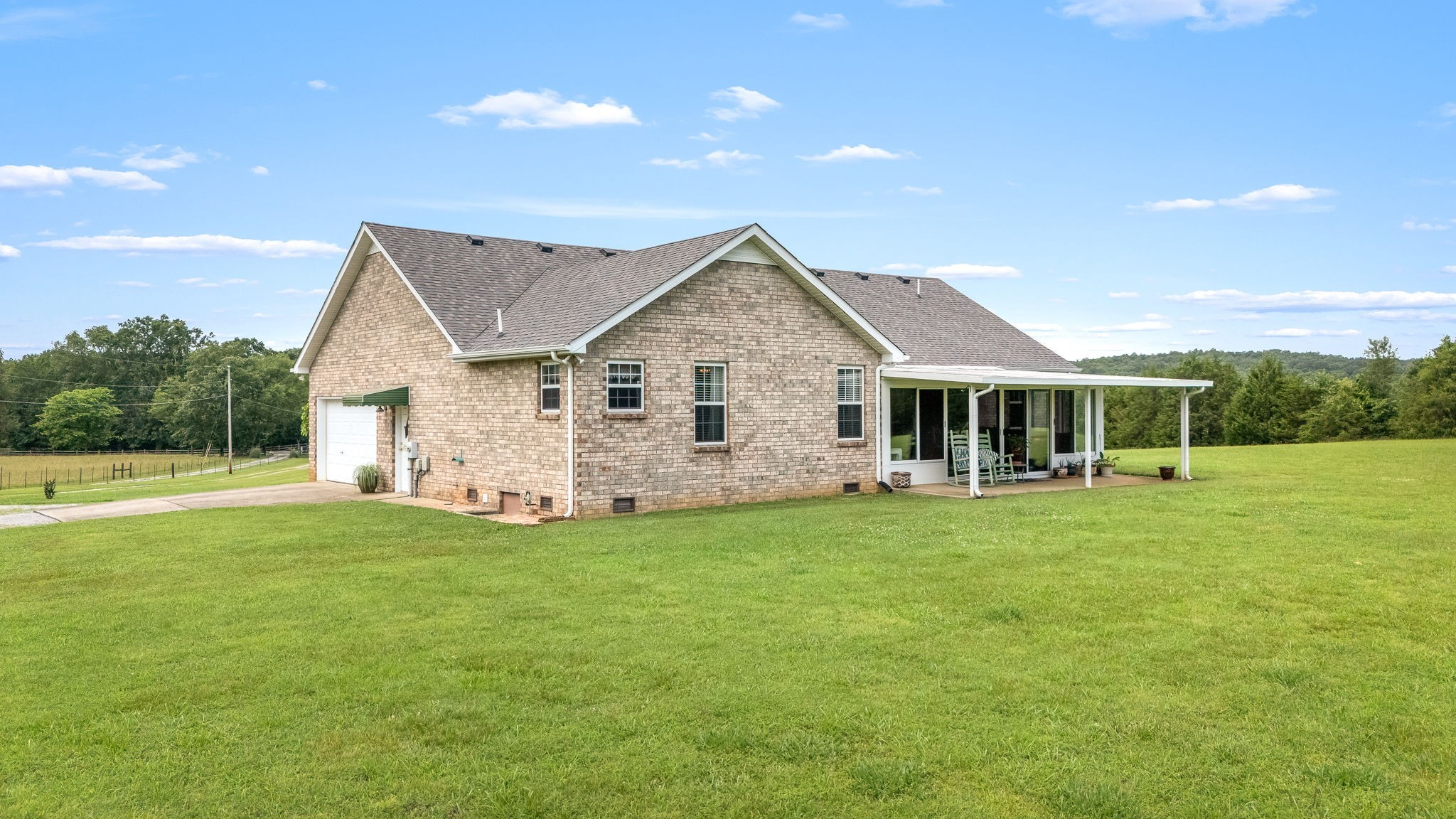 4330 River Lane Milton, TN 37118 - Photo 33 of 44 a front view of a house with a garden