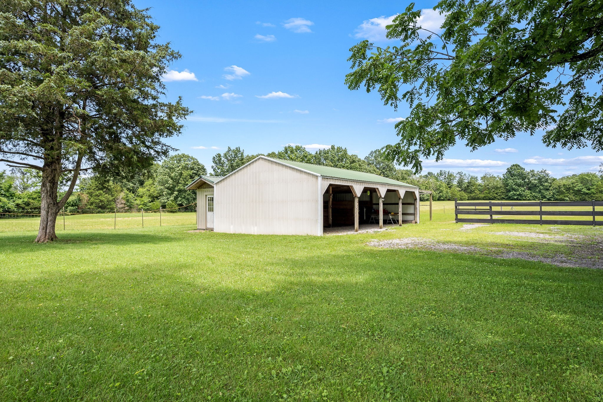 4330 River Lane Milton, TN 37118 - Photo 36 of 44 a view of a house with a backyard