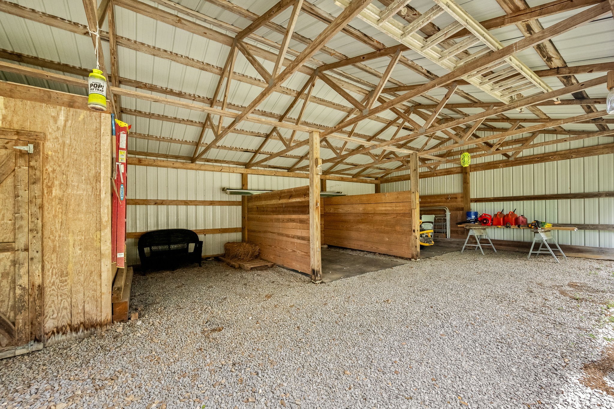 4330 River Lane Milton, TN 37118 - Photo 38 of 44 a view of a garage with furniture and a garage