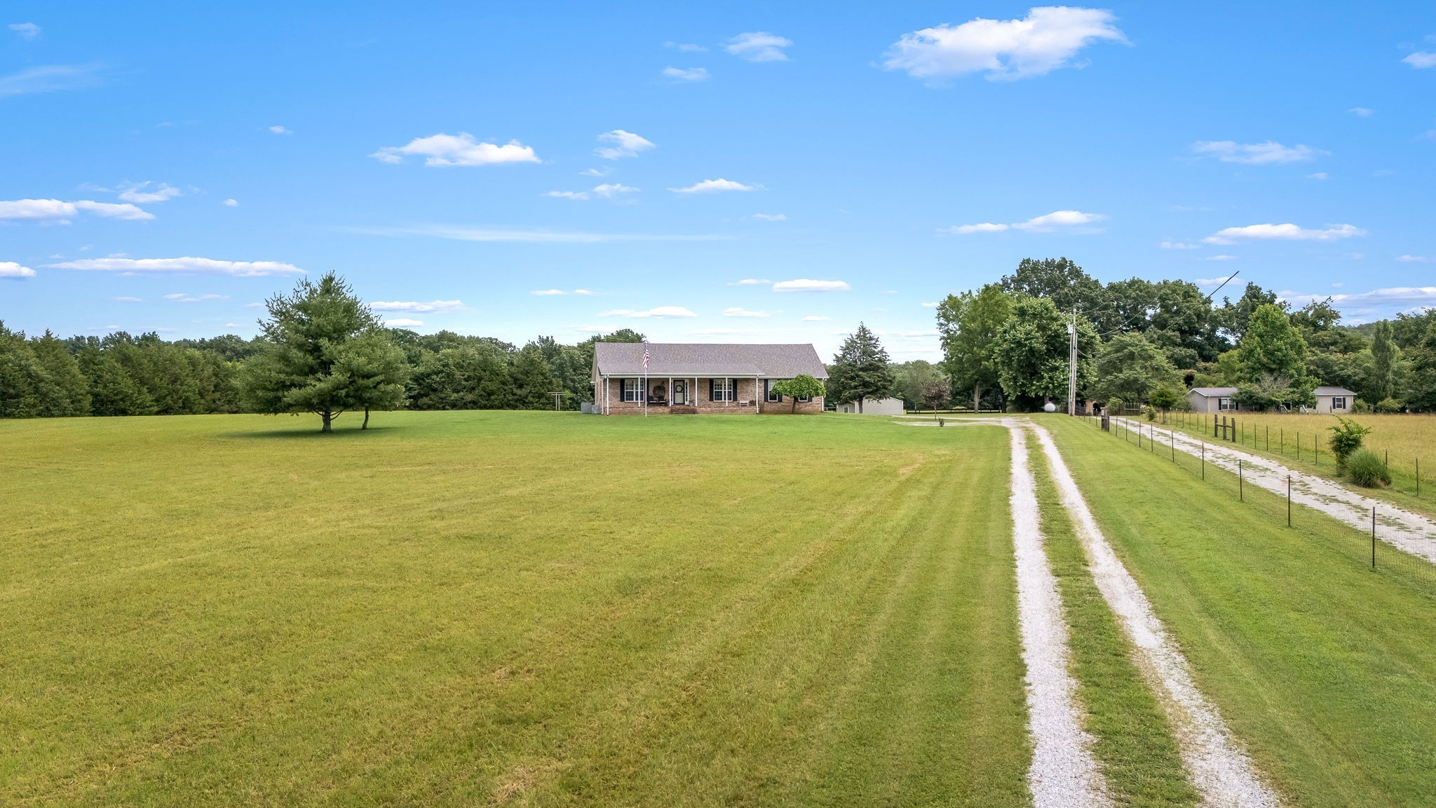 4330 River Lane Milton, TN 37118 - Photo 41 of 44 a view of a lake with a big yard