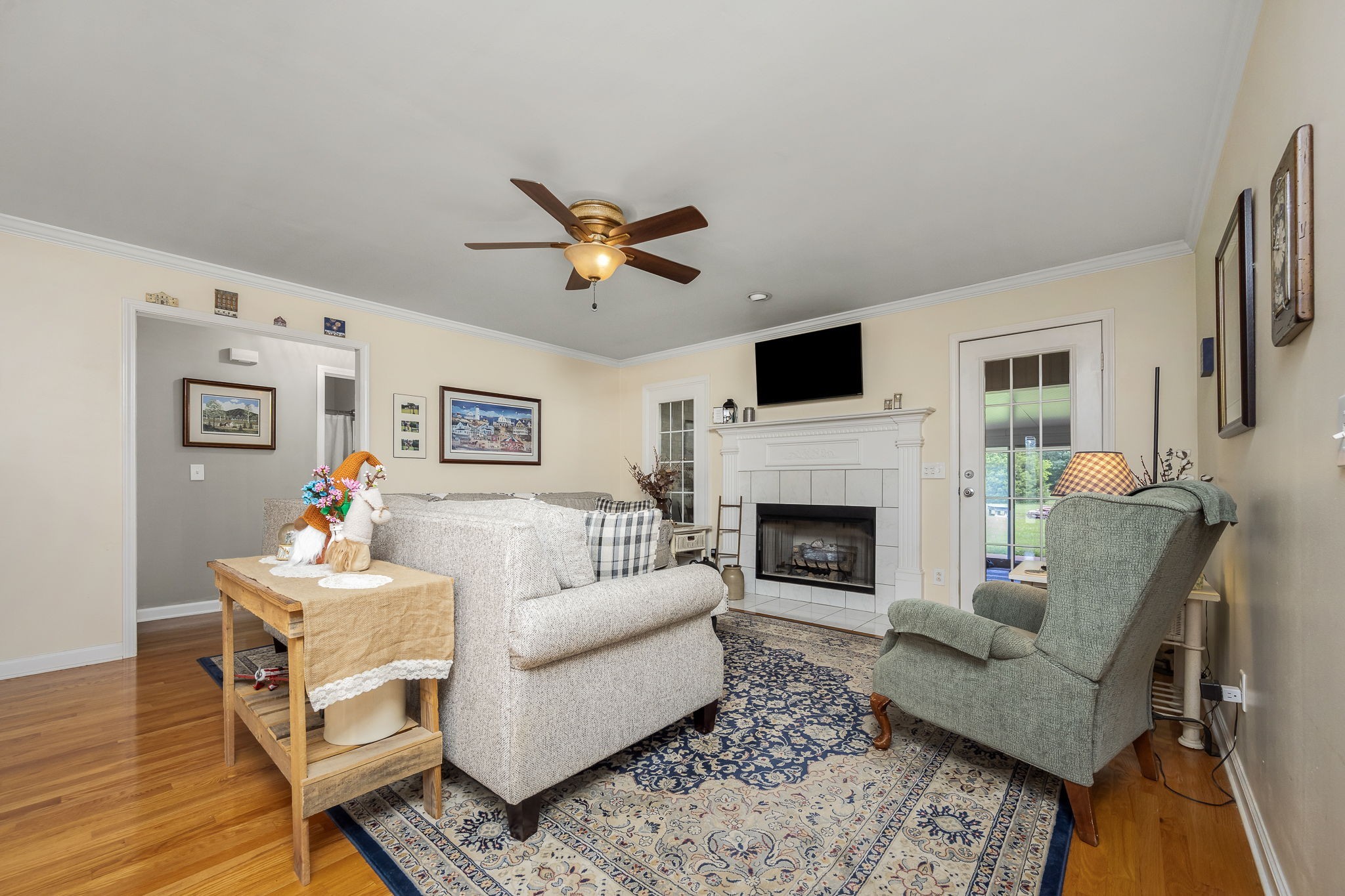4330 River Lane Milton, TN 37118 - Photo 8 of 44 a living room with furniture a fireplace and a flat screen tv