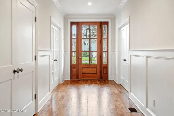a view of a dining room with furniture and a fireplace