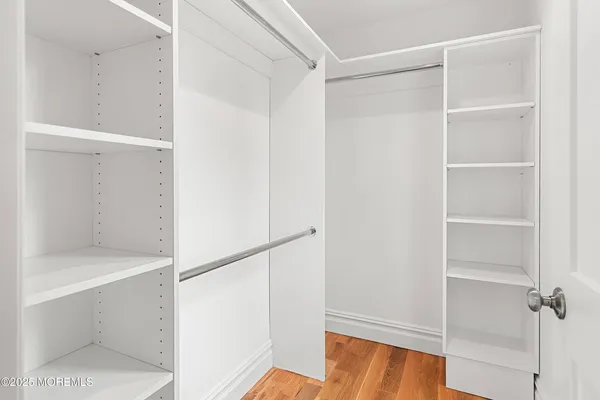 a view of a hallway with windows