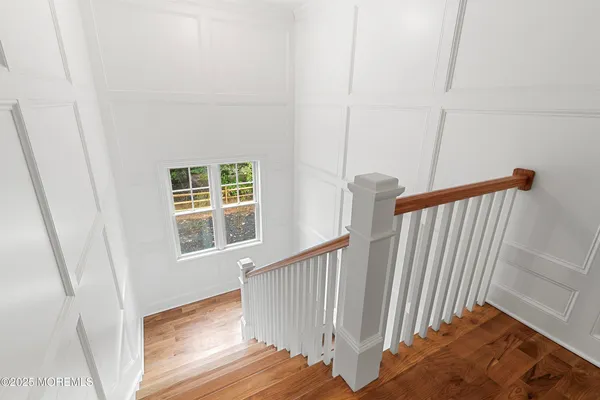 front of a house with potted plant