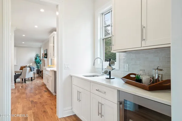a kitchen with sink and stove