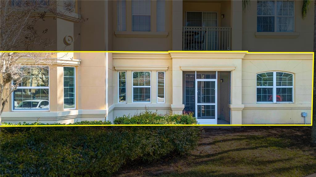 707 Terrace Ridge Circle, Unit 707 Davenport, FL 33896 - Photo 2 of 59 a front view of a house having yard