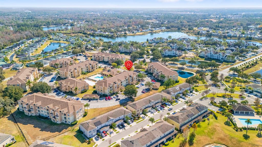 707 Terrace Ridge Circle, Unit 707 Davenport, FL 33896 - Photo 35 of 59 an aerial view of residential houses with outdoor space