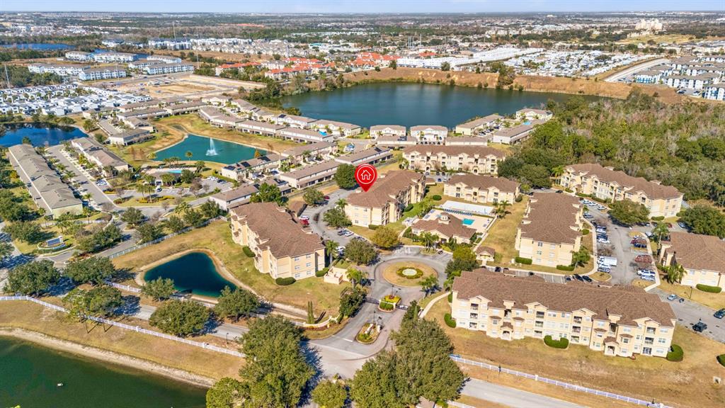 707 Terrace Ridge Circle, Unit 707 Davenport, FL 33896 - Photo 37 of 59 an aerial view of residential houses with outdoor space