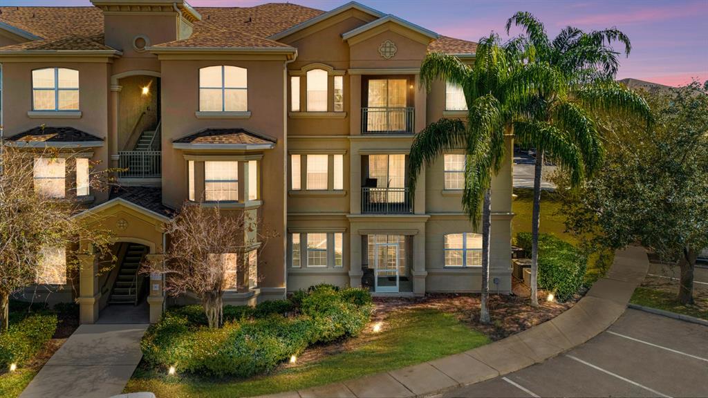 707 Terrace Ridge Circle, Unit 707 Davenport, FL 33896 - Photo 45 of 59 a front view of a house