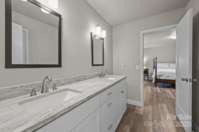 a bathroom with a toilet and shower