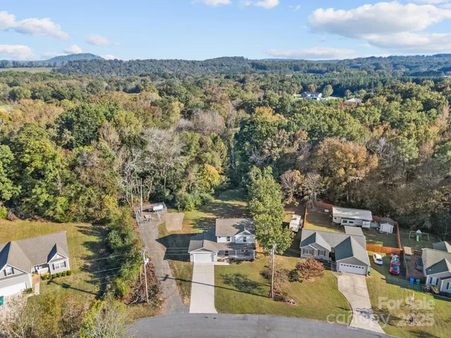 an aerial view of residential house with outdoor space
