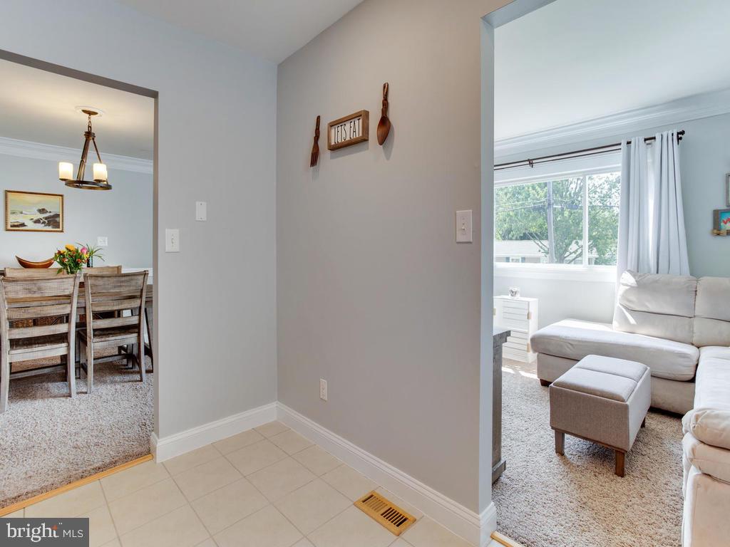 132 Oakwood Road Edgewater, MD 21037 - Photo 10 of 37 a living room with furniture and a window