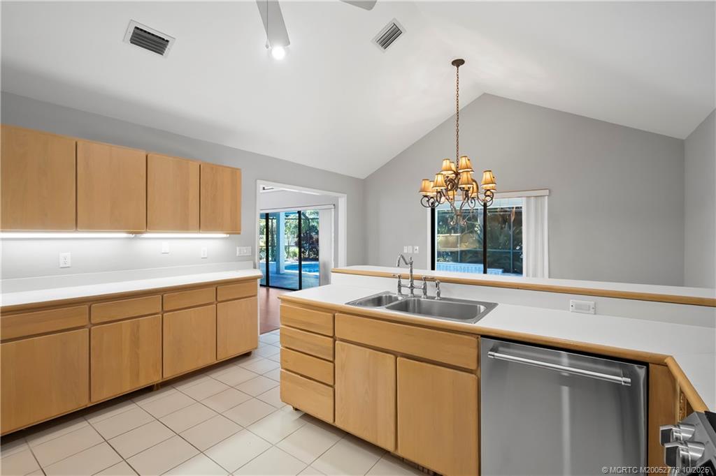 101 South Sewalls Point Road Stuart, FL 34996 - Photo 23 of 41 a kitchen with sink and window