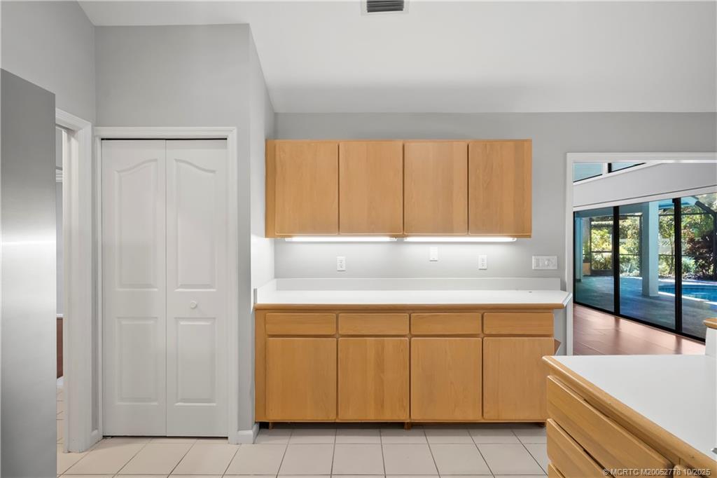 101 South Sewalls Point Road Stuart, FL 34996 - Photo 24 of 41 a view of a kitchen with a sink cabinets and a window