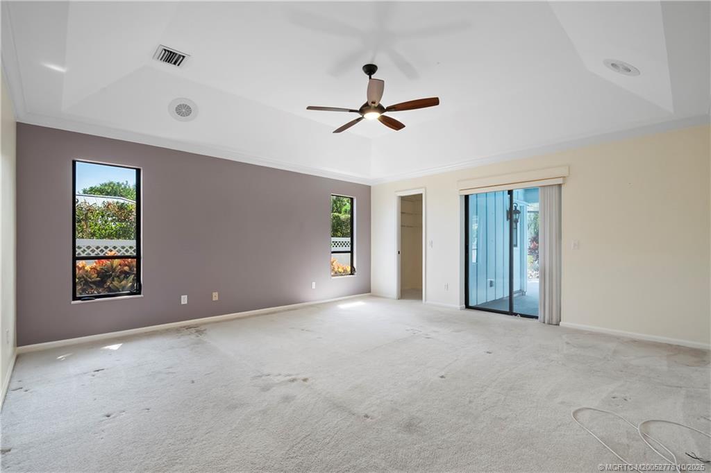 101 South Sewalls Point Road Stuart, FL 34996 - Photo 28 of 41 an empty room with windows and closet