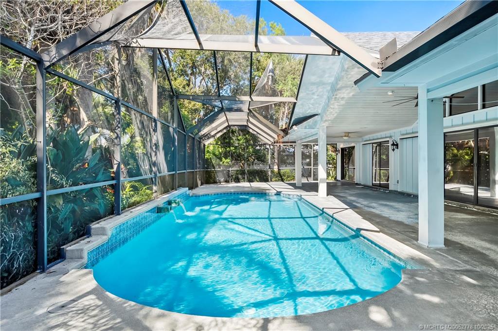 101 South Sewalls Point Road Stuart, FL 34996 - Photo 36 of 41 a view of a house with a swimming pool