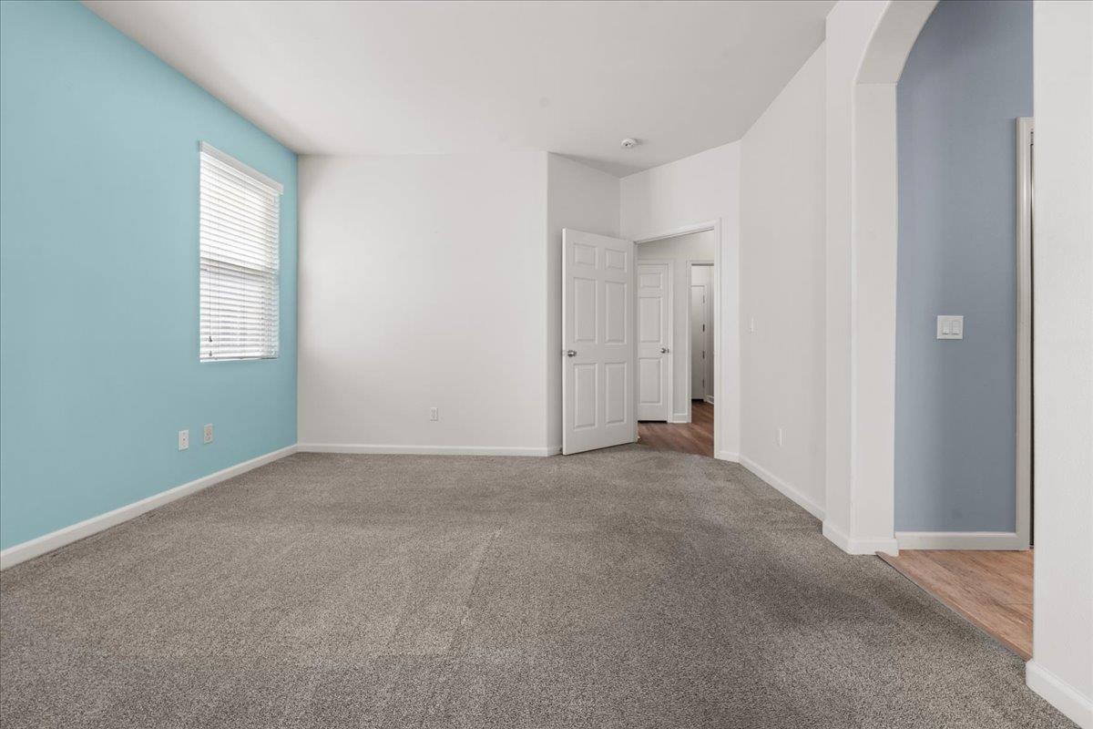 478 Churchill Way Salinas, CA 93906 - Photo 14 of 31 a view of an empty room with windows and closet