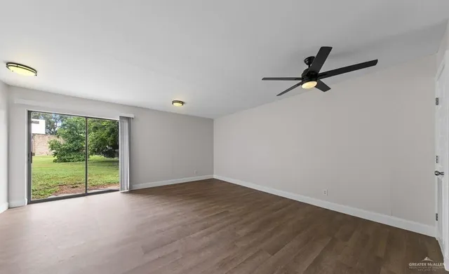 a view of a room with a large window