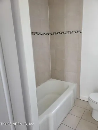 a bathroom with a bathtub